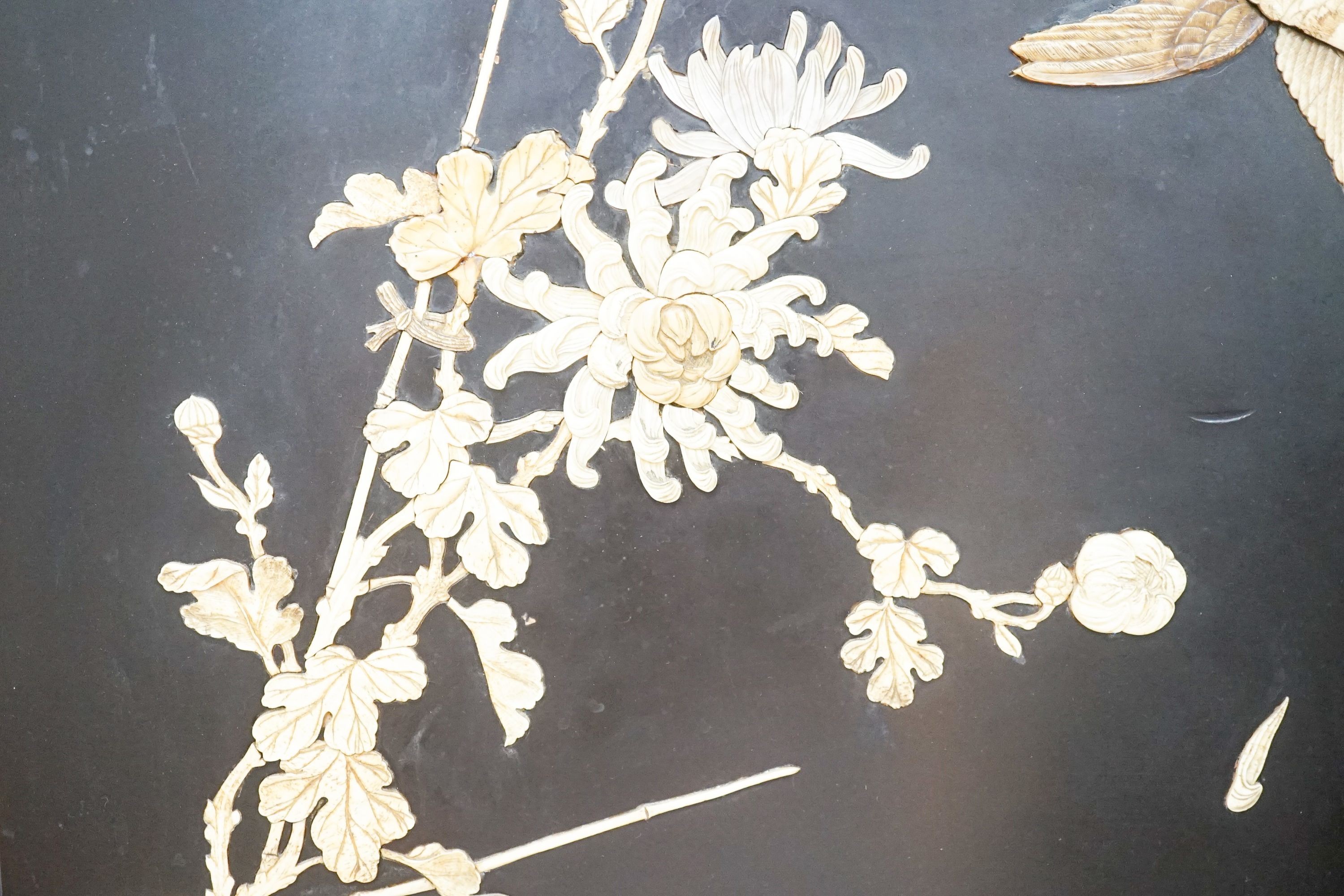 A pair of late 19th century Japanese bone and mother of pearl inlaid shibayama style panels of birds amid flowers, 91 x 51cm